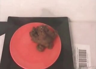 His girlfriend is filmed while serving him warm poop